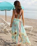 Vista posterior de la falda RIVA BLUE con estampado floral y volantes