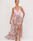 Falda envolvente floral con volantes y abertura lateral combinada con vestido de baño rosa