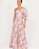 Pantalón floral tiro alto de silueta amplia vista frontal elegante