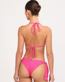 Vista posterior del top bikini Gioia di Sole fucsia con amarre ajustable en cuello y espalda.